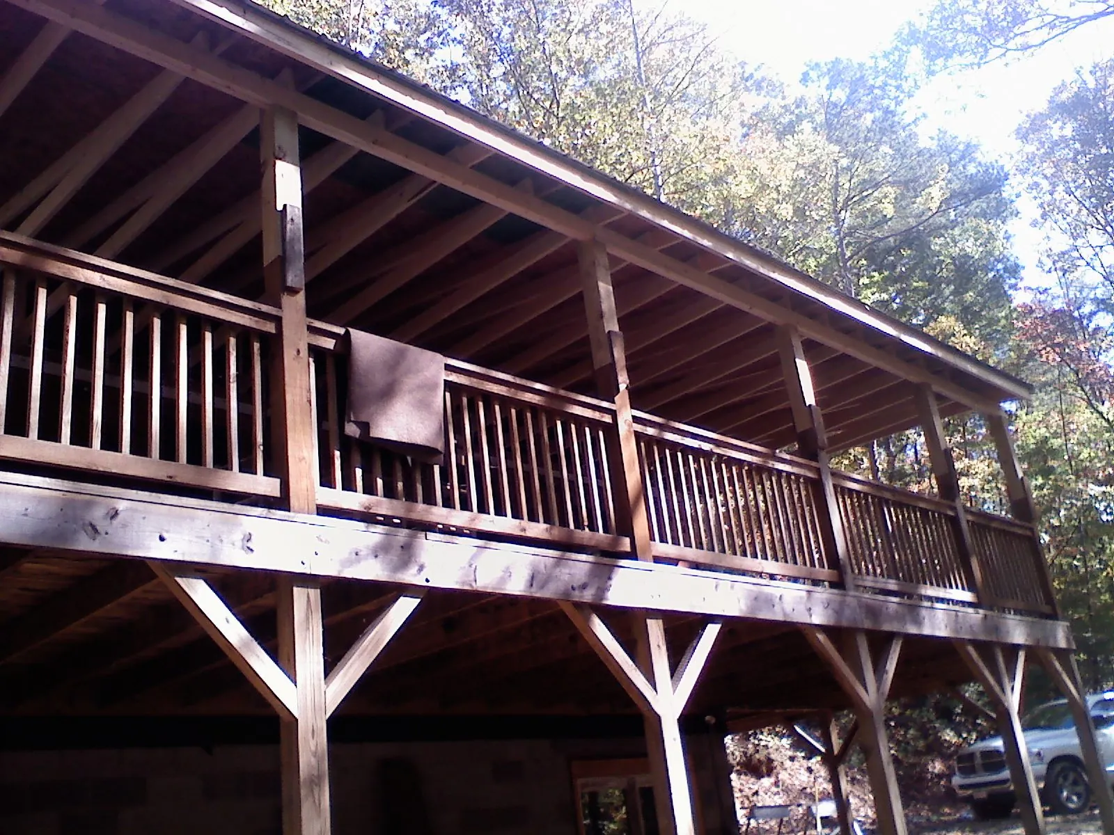 Timber framing under a new elevated porch and deck — Roof Leak Repair in Colorado Springs by Roofing Brothers